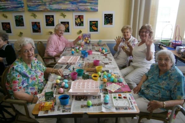picture of elderly group of seniors smiling in Tequesta Terrace
